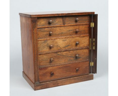 A Victorian mahogany miniature table top chest with locking side pilaster and turned handles, 39.5cm high. Condition Report. 