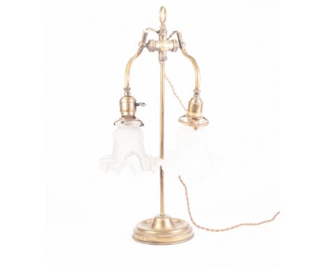 EARLY TWENTIETH CENTURY FRENCH BRASS TWIN LIGHT ADJUSTABLE TABLE LAMP, with scroll arms, moulded frosted glass shades with fr