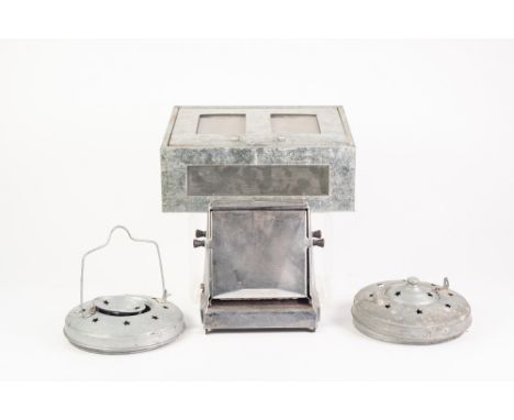 PAIR OF TIN AND FABRIC COLLAPSIBLE TEA LIGHT LANTERNS, each with pierced cover, one lacking Handle, together with a WINDOWSIL