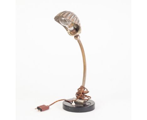 EARLY TWENTIETH FRENCH CENTURY BRASS AND CHROME PLATED ADJUSTABLE DESK LAMP, with shell pattern shade and circular black japa