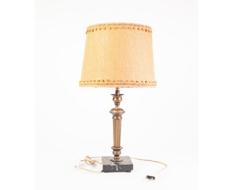 FRENCH GILT METAL TABLE LAMP, of tapering, part fluted form with black veined marble square base and cloth covered shade, 19"