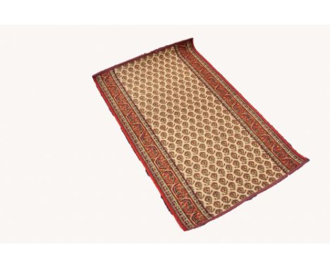 A BELGIUM 'SUPER TAJ' LOOM WOVEN ALL-WOOL RUG, of Persian all-over floral design on a fawn field, 4'4" long, 2'3"  wide and T