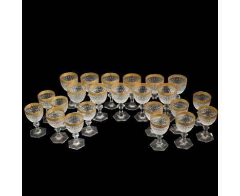 Part suite of crystal drinking glasses comprising thirteen red wine glasses and twelve white wine glasses, all with foliate g