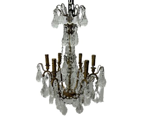India Jane Interiors - brass and crystal six-branch chandelier, each branch holds a single candle-style bulb holder detailed 