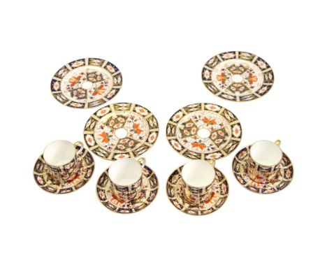 Set of four Royal Crown Derby Imari pattern coffee cans and saucers, pattern 2451and a set of four matching plates D15cm