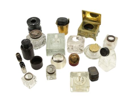 Victorian and later inkwells to include a brass casket form inkwell with hinged cover, a novelty inkwell in the form of a coa