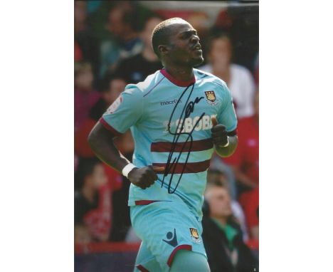 Mohamed Diame 12x8 signed colour photo in West Ham kit. Senegal footballer played for West Ham 2012-2014 currently playing fo