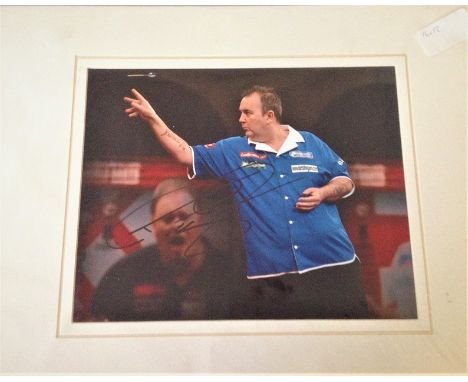 Phil the power Taylor 10x12 colour photo mounted to 16 x 12 overall. In action in the world championship at Alexandra palace.