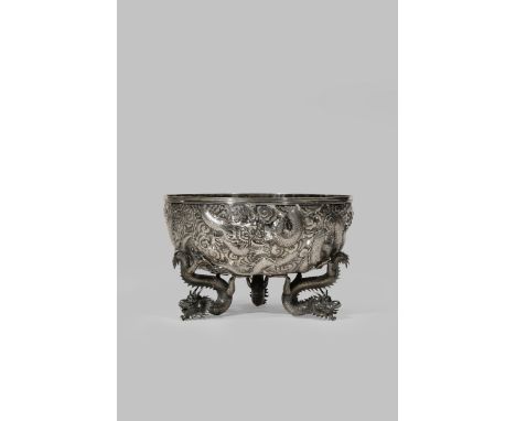 A CHINESE SILVER 'FIVE DRAGON' BOWL LATE QING DYNASTY The body with a reticulated design of five dragons chasing a sacred jew