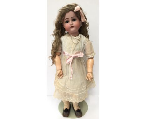Early 20th century Kämmer & Reinhardt/ Simon & Halbig (Germany) bisque head doll, impressed 'K&R' with star symbol 'Simon & H