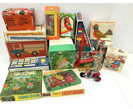 Quantity of Eastern European and other tinplate novelty toys, includes reproduction tinplate elephant on tricycle and Romania