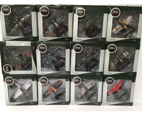 12 x Oxford Aviation 1/76 scale Front Line Fighters aircraft models, includes AC035 Brewster Buffalo F2A-3. M and boxed. 