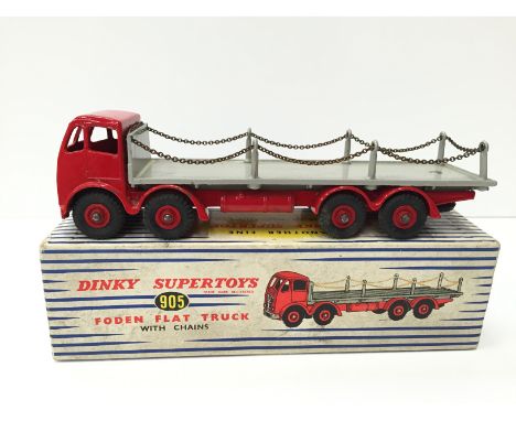 Dinky Supertoys 905 Foden Flat Truck with Chains, with red cab and chassis, grey flatbed, rounded bosses and red hubs. G/VG w
