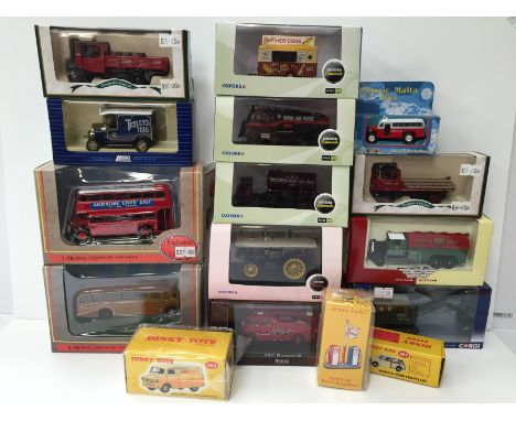 A box containing 16 x mostly 1:76 Scale models by HORNBY, EFE, CORGI Trackside, and OXFORD Diecast, Atlas Dinky reproductions