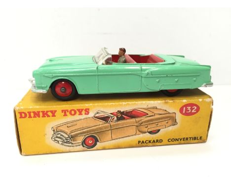 Dinky Toys 132 Packard Convertible, light green with red interior and hubs and tan driver. G/VG in G+ box with correct colour