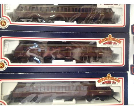 Three OO scale Bachmann BR MK1, Suburban coaches, two maroon 34-602 and one 34-626. All in excellent condition, boxes have we