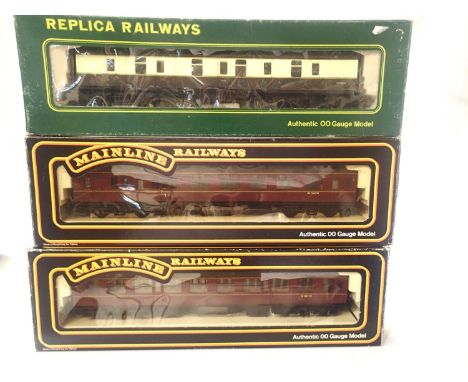 Three OO scale coaches; Replica MK1, BG choc/cream, Mainline 937308 Collett brake BR Maroon and Mainline 937309 Collett 2nd B