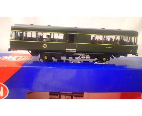 OO scale Heljan 8753, Park Royal railbus, green with small yellow panels, with passengers. In excellent condition, box with s