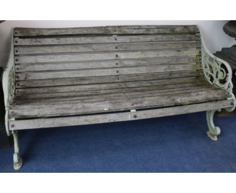A Victorian style cast iron bench, W.158cm