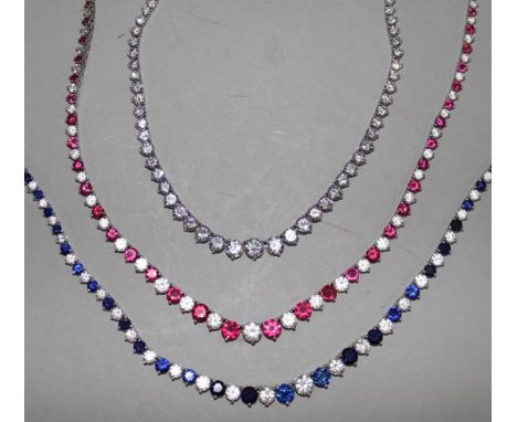 Three sterling silver and graduated paste set necklaces, including simulated ruby and diamond and simulated sapphire and diam