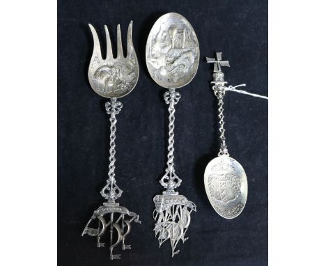 A Dutch embossed silver spoon with tavern scene bowl and galleon finial, a similar fork with Viking ship finial and a souveni