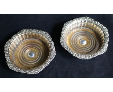 A pair of 19th century Old Sheffield plated wine coasters, 17cm.