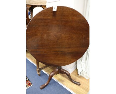 A George III circular tilt-top tripod table, W.80cm