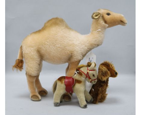 A Steiff camel, a Steiff 1960's miniature pony and an Irish Setter, all with button in ear