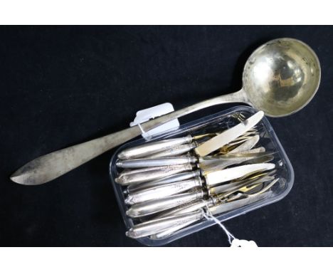 A silver 800 standard soup ladle (Austrian import mark) and ten pairs of silver-handled (800) fruit eaters (gilt loss to knif