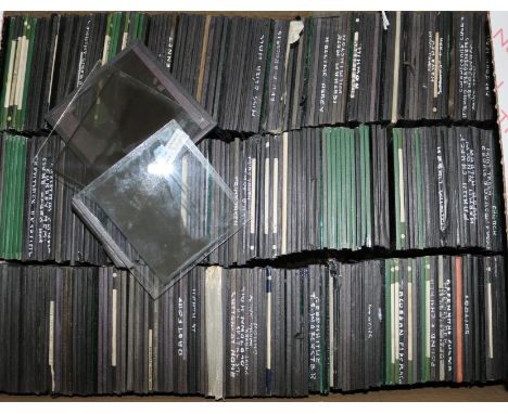 A collection of over 350 magic lantern slides, various subjects including churches, famous buildings, paleontology, etc.