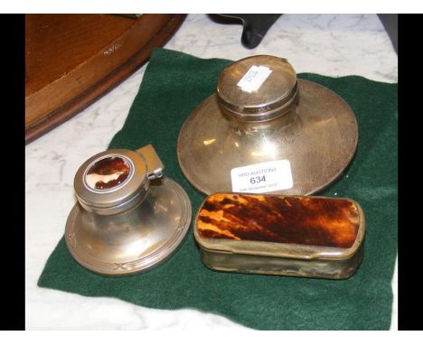 A silver capstan inkwell, another inkwell and a snuff box 