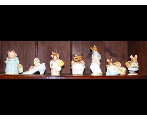Seven Beatrix Potter ceramic figures including Aunt Pettitoes and Mrs Tiggy Winkle