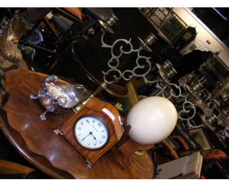 A Mappin &amp; Webb satinwood clock, a pair of three branch brass table candelabras, an Ostrich egg and stand, etc. 