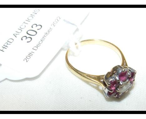 A ruby and diamond ring in 18ct mount
