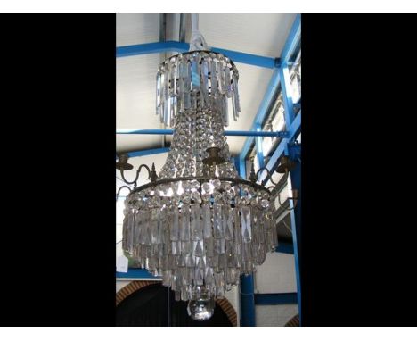 A decorative antique chandelier - 78cms in length