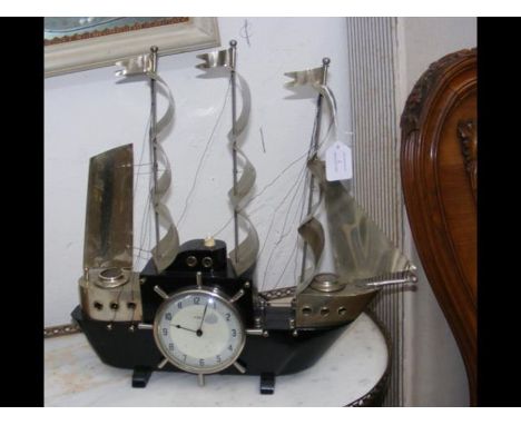 A Metamec 'Ship' table lamp clock - 45cm high  