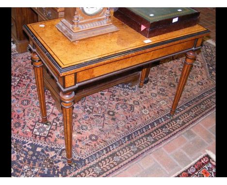 A 19th century amboyna card table on tapered legs - width 92cm 