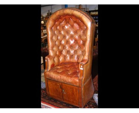 A Victorian leather Porters chair with button back and seat -  cupboard belowCONDITION REPORTFront door slightly ricketyDimen