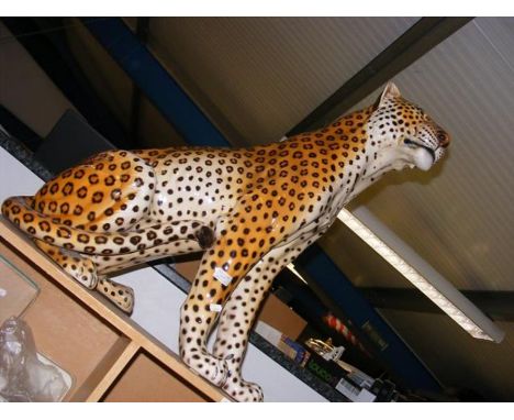 A ceramic Leopard - height 75cms (foot damaged)CONDITION REPORTIn our judgement, condition of lot is fair. Notably, the item 