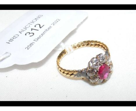 An 18ct ruby and diamond cluster ringCONDITION REPORTWe have attached a number of additional images to showcase the lot in fu