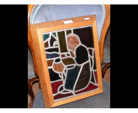 A 31cm x 23cm old stained glass panel in a frame that illuminates from behind
