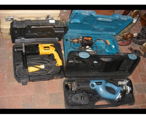 A Dewalt heavy duty rotary hammer drill in case together with Makita and Erbauer power tools