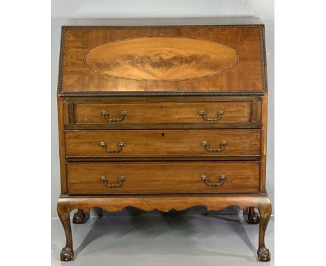 VINTAGE MAHOGANY FALL FRONT BUREAU with beaded oval panel to the fall and moulded edging, Greek Key embossed leather effect w