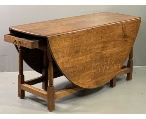 WAKE TYPE OAK TWIN FLAP GATE LEG TABLE having opposing end drawers, 76cms H, 152cms L, 57cms W (closed), 182cms W (fully open