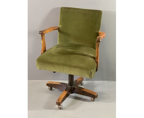 VINTAGE OAK UPHOLSTERED OFFICE ARMCHAIR, swivel, rise and fall action, in green velour upholstery, 87cms H, 58cms W, 40cms D 