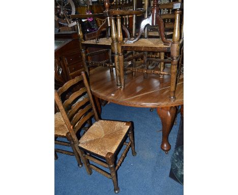 AN EARLY 20TH CENTURY MAHOGANY OVAL WIND OUT DINING TABLE, with two additional leaves, approximate extended size width 238cm 