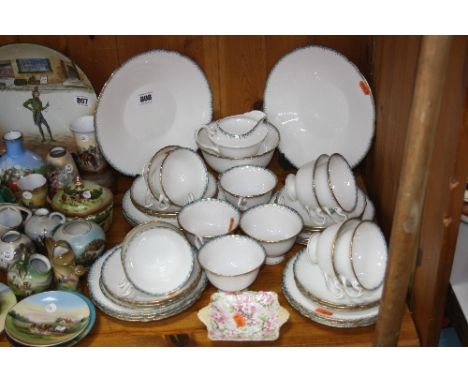 A SHELLEY LATE FOLEY TEASET, 'Gainsborough' shape, turquoise and gilt trim on white ground, to include two cake plates, milk 