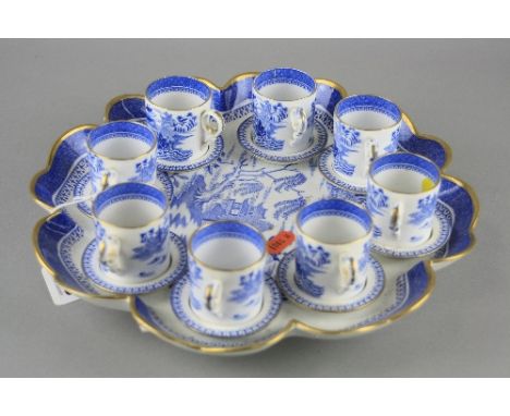 A COPELAND 'WILLOW' PATTERN CABARET SET, comprising eight demi tasse coffee cans and saucers, together with a comport style t