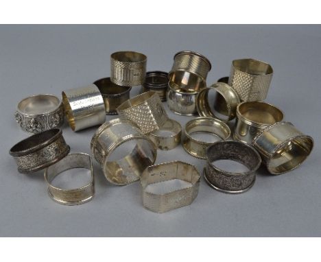 A COLLECTION OF TWENTY SILVER NAPKIN RINGS, approximate weight 495 grams