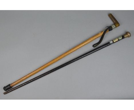 A SILVER TOPPED CANE, and another stick